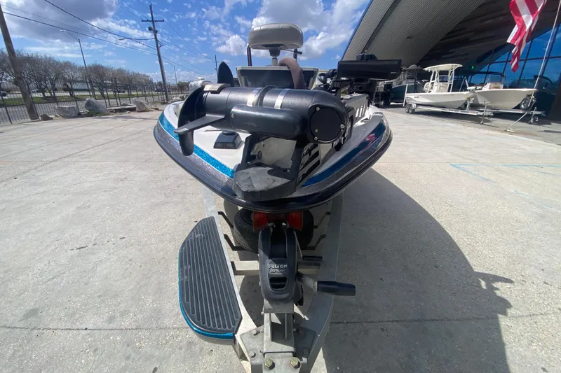 Slide: The Image of 2013 Ranger Z518 Intracoastal boat on trailer, outdoor dealership setting. - 9