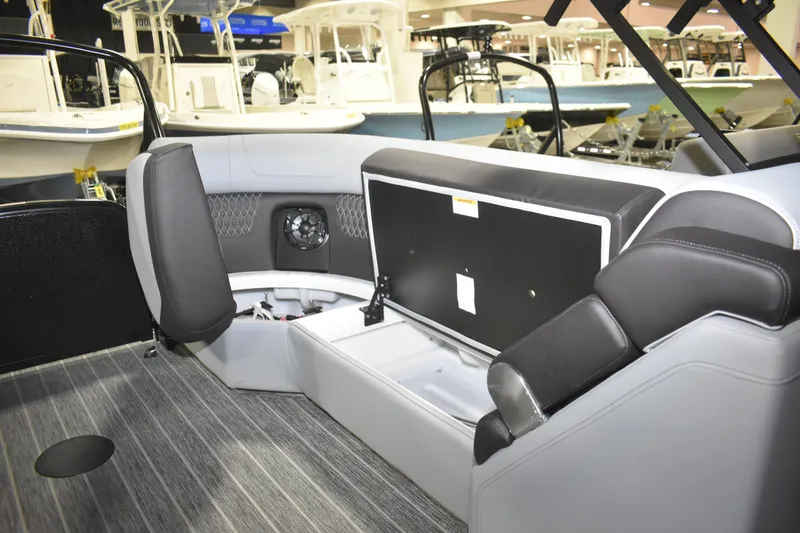 Slide: The Image of 2026 Premier 230 SOLARIS RF - PTX CL boat interior with open storage compartment. - 15