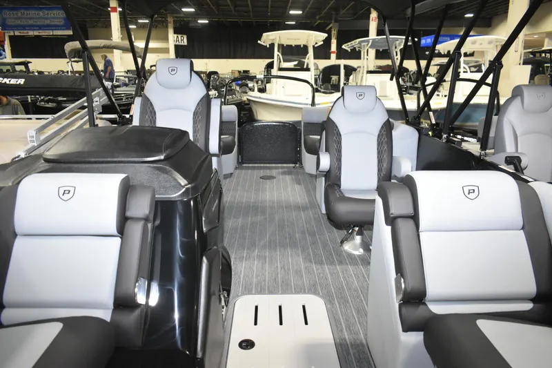 Slide: The Image of 2026 Premier 230 SOLARIS RF - PTX CL boat interior with luxurious seating and modern design. - 23