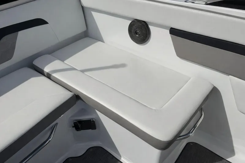Slide: The Image of 2021 Four Winns HD1 OB boat interior seating with speaker and sleek design. - 10
