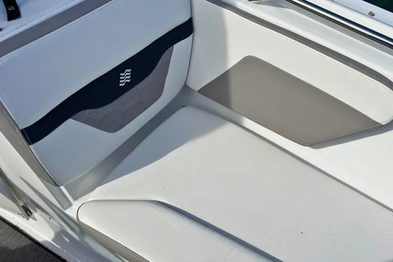 Slide: The Image of 2021 Four Winns HD1 OB boat interior seating with modern design and comfortable upholstery. - 24