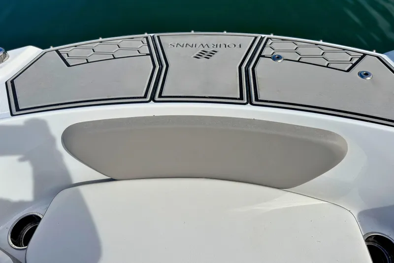 Slide: The Image of 2021 Four Winns HD1 OB boat deck with stylish design and logo. - 25