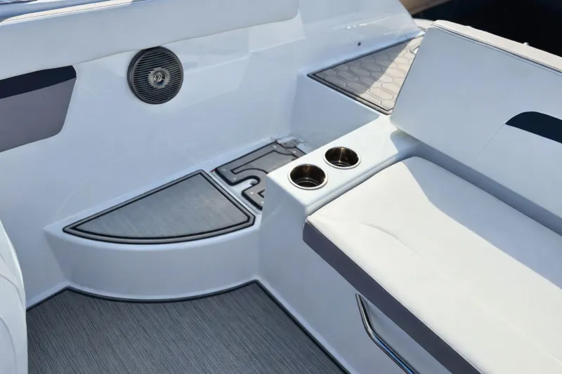 Slide: The Image of Interior of 2021 Four Winns HD1 OB boat with seating and cup holders. - 7