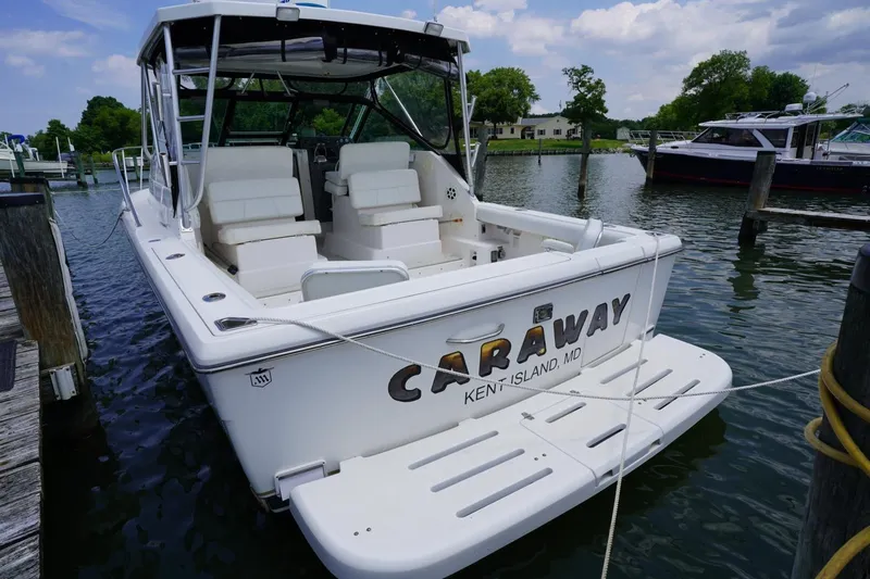 Slide: The Image of 2004 Tiara Yachts 2900 Open Classic docked at Kent Island marina. - 14