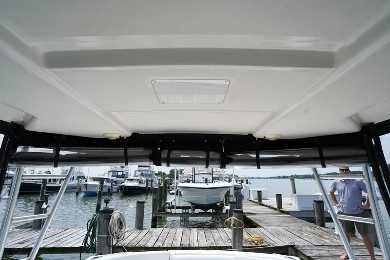 Slide: The Image of 2004 Tiara Yachts 2900 Open Classic at marina dock, interior view. - 46