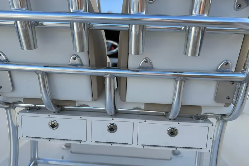 Slide: The Image of 2026 Bulls Bay 255 Center Console boat seating and storage compartments. - 11