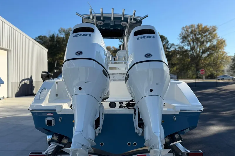 Slide: The Image of 2026 Bulls Bay 255 Center Console boat with dual 200 horsepower engines. - 4