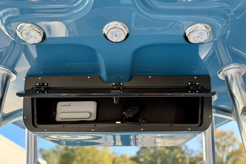 Slide: The Image of 2026 Bulls Bay 255 Center Console boat with Garmin equipment in storage compartment. - 9