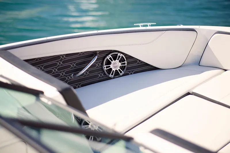 Slide: The Image of Manufacturer Provided Image: 2025 Sea Ray SPX 210 boat interior with speaker, sleek design, and comfortable seating. - 6