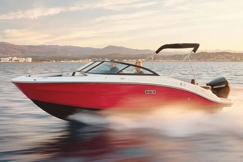 The Image of Manufacturer Provided Image: 2025 Sea Ray SPX 210 OB boat cruising on open water at sunset. - 0