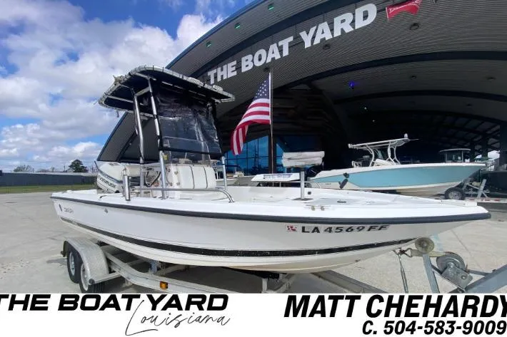 The Image of 2002 Century 2101 Bay Boat on trailer at The Boat Yard, Louisiana. - 1