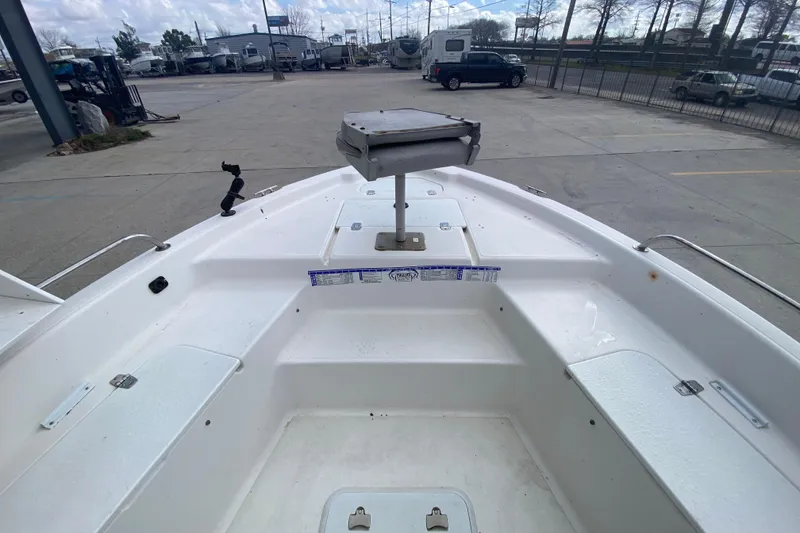 Slide: The Image of 2002 Century 2101 Bay Boat deck view in a marina setting. - 4