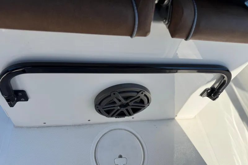 Slide: The Image of 2022 Sea Hunt Ultra 265 SE boat interior with speaker and grab rail. - 14