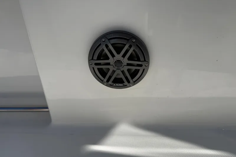 Slide: The Image of Speaker on 2022 Sea Hunt Ultra 265 SE boat, featuring sleek design and modern audio system. - 19