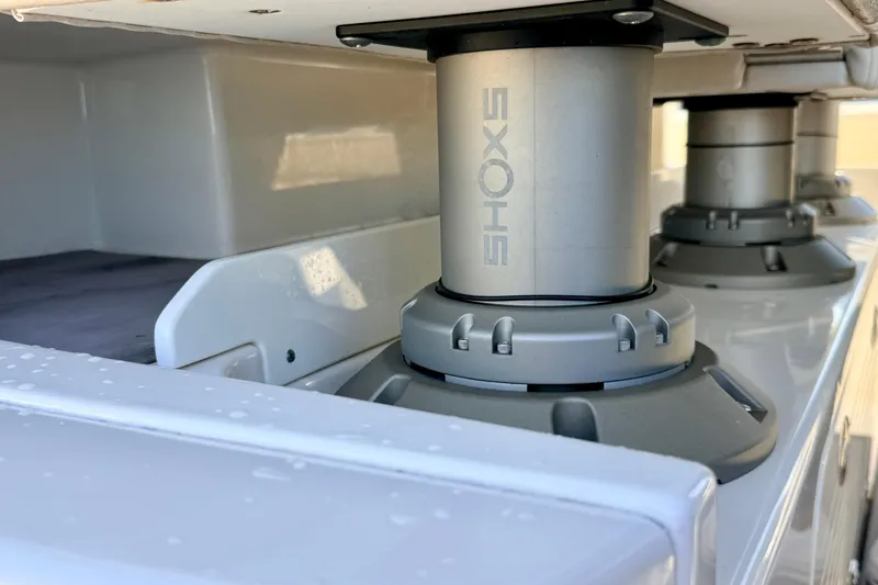 Slide: The Image of 2024 Solace 41 CS boat with SHOCKS suspension system detail. - 24