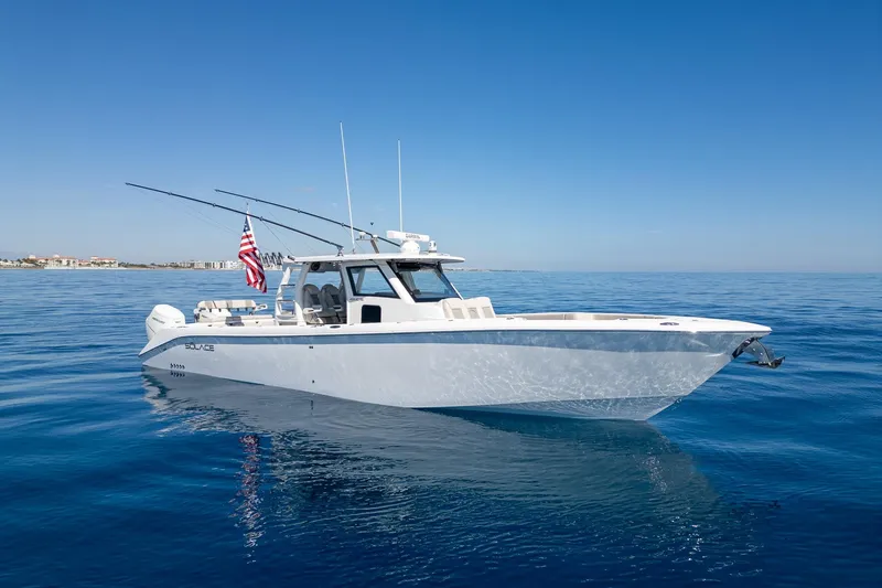 Slide: The Image of 2024 Solace 41 CS boat on calm ocean with clear blue sky. - 3