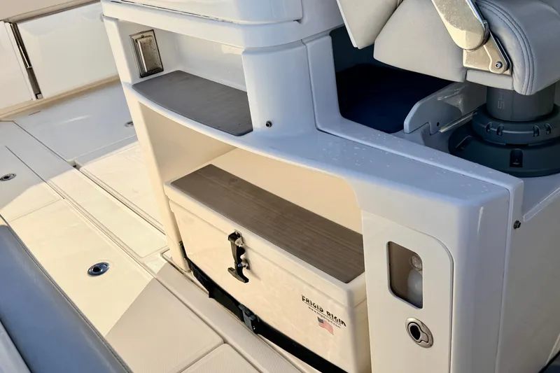 Slide: The Image of 2024 Solace 41 CS boat interior with storage and seating area. - 31