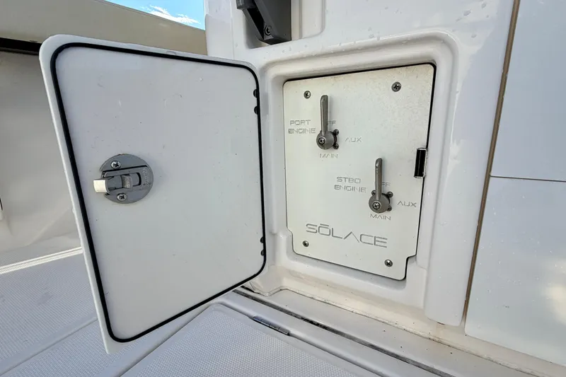 Slide: The Image of 2024 Solace 41 CS engine control panel with open access door. - 32