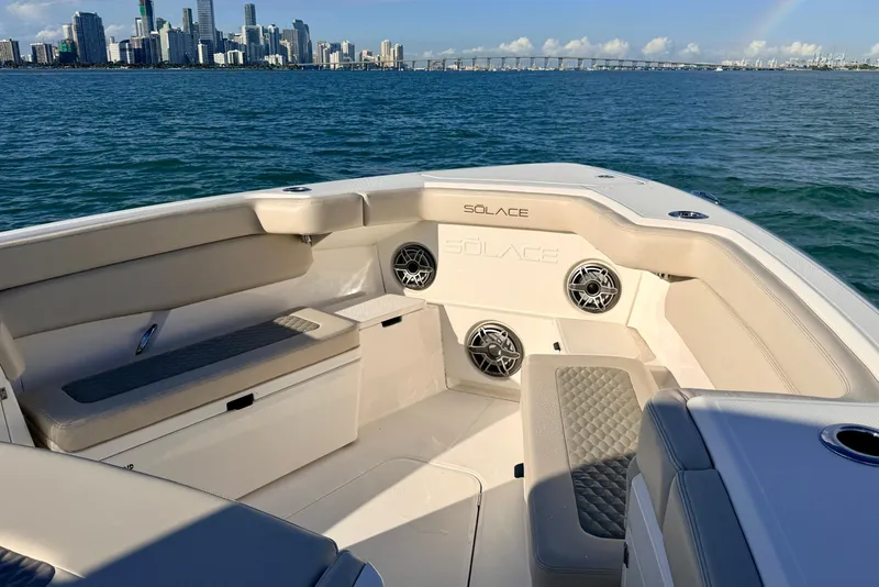 Slide: The Image of 2024 Solace 41 CS boat interior with city skyline and ocean view. - 39