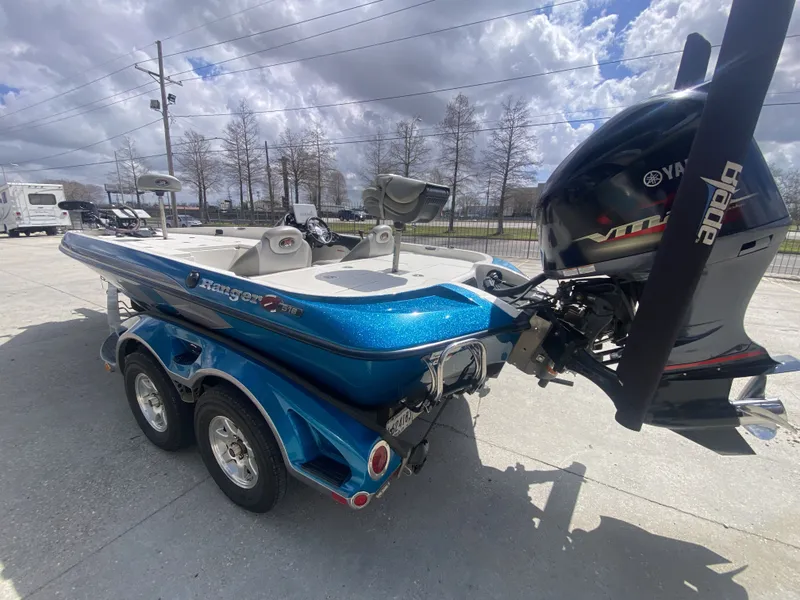 Slide: The Image of 2013 Ranger Z518i Intercoastal boat with Yamaha engine, blue hull, on trailer. - 16