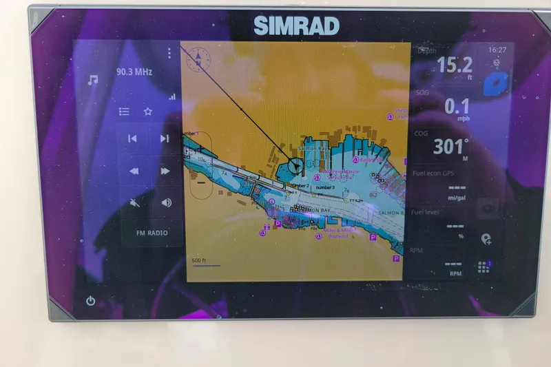Slide: The Image of Simrad navigation display on 2023 Boston Whaler 210 Montauk boat, showing map and data. - 12