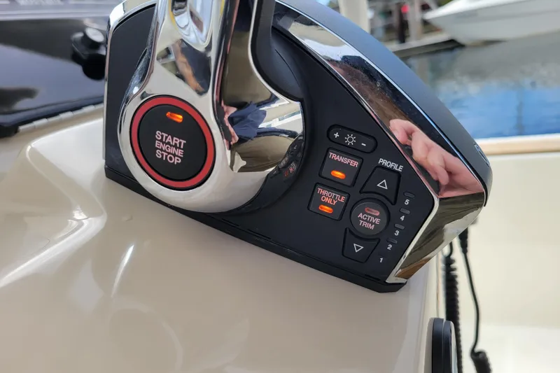 Slide: The Image of Control panel of 2023 Boston Whaler 210 Montauk boat with start engine button. - 17