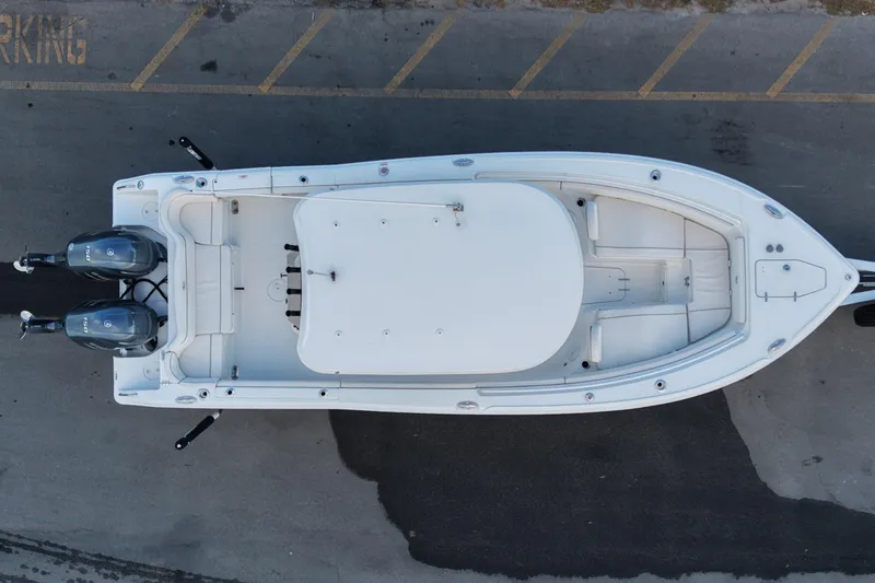 Slide: The Image of Top view of 2023 Sea Hunt Ultra 265 SE boat with dual engines. - 9