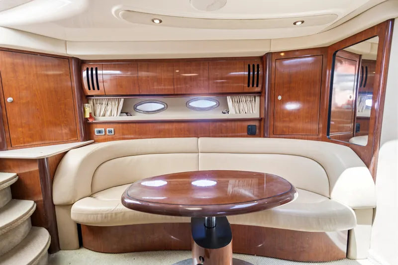 Slide: The Image of Luxurious interior of 2004 Sea Ray 420 Sundancer yacht with elegant wood finishes. - 32