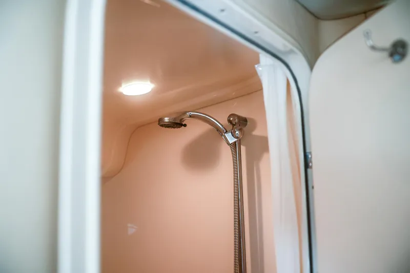 Slide: The Image of Shower area inside 2004 Sea Ray 420 Sundancer yacht, featuring modern fixtures. - 42