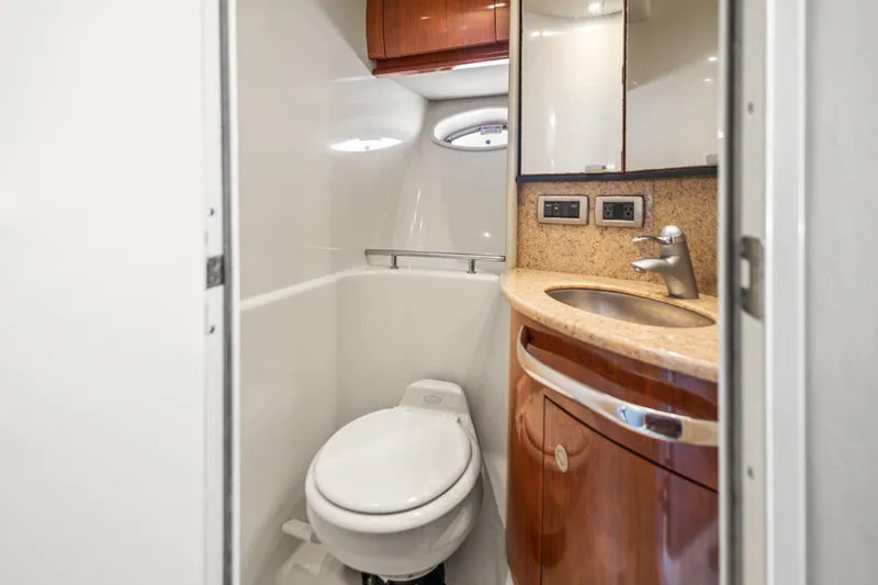 Slide: The Image of Luxurious bathroom in 2004 Sea Ray 420 Sundancer yacht with modern fixtures. - 50
