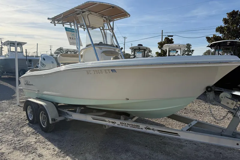 Slide: The Image of 2021 Pioneer 202 Islander boat on trailer, displayed outdoors for sale. - 15