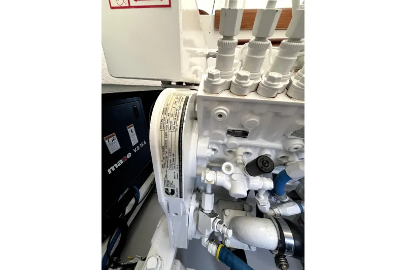 Slide: The Image of Engine compartment of a 1982 Torres Boat Mfg 43, featuring detailed mechanical components. - 25