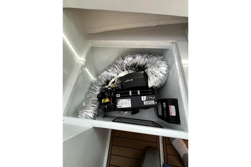 Slide: The Image of Air conditioning unit in a 1982 Torres Boat Mfg 43, featuring CTM components. - 20