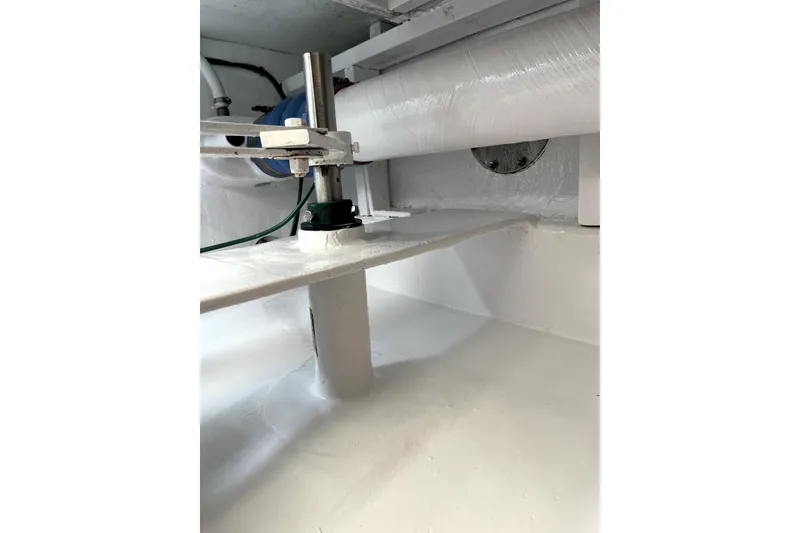 Slide: The Image of Engine compartment of a 1982 Torres Boat Mfg 43, showcasing mechanical components. - 28