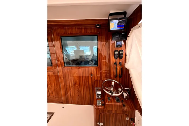 Slide: The Image of Polished wooden cabin doors on a 1982 Torres Boat Mfg 43 model. - 42