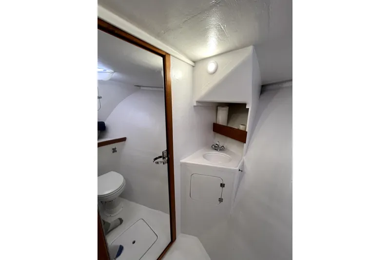 Slide: The Image of Custom 1982 model 43 boat "Tridente" anchored in clear blue waters near Culebra, Puerto Rico. - 6