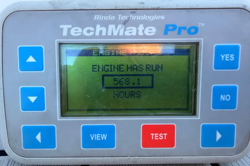 Slide: The Image of TechMate Pro display showing engine run time of 568.1 hours for 2014 Tidewater 230 LXF. - 35