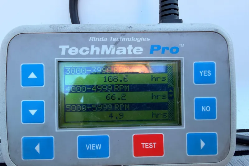 Slide: The Image of Rinda TechMate Pro displaying engine hours for Tidewater 230 LXF, 2014 model. - 37