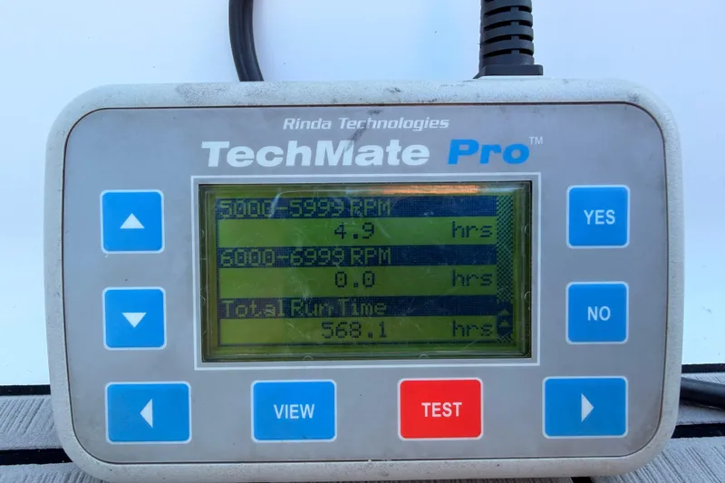 Slide: The Image of Rinda Technologies TechMate Pro displaying engine run hours for Tidewater 230 LXF, 2014 model. - 38