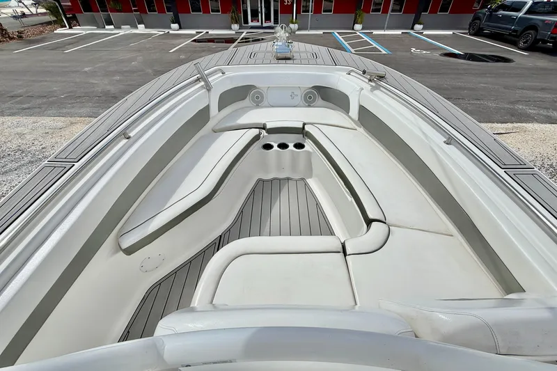 Slide: The Image of 2014 Tidewater 230 LXF boat interior with spacious seating and cup holders. - 8
