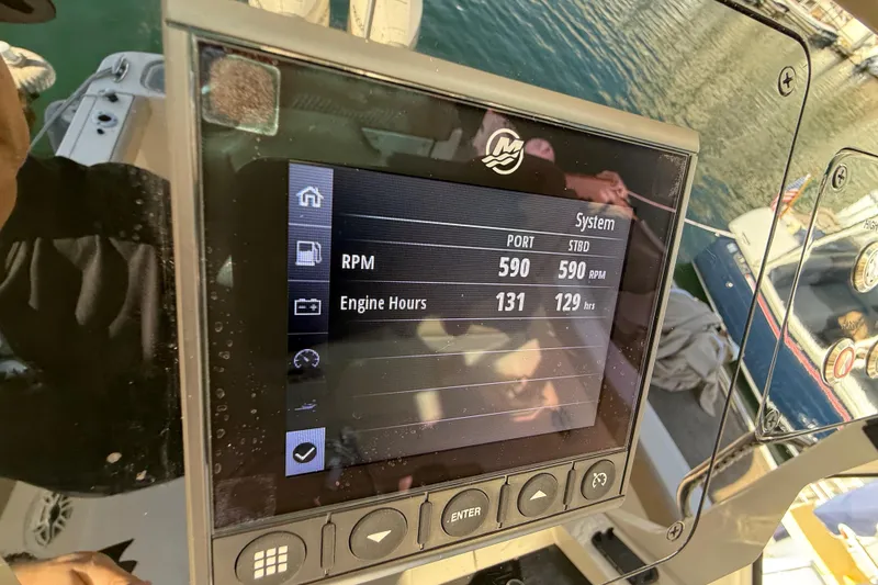 Slide: The Image of Display screen on 2024 Scout 260 LXF showing RPM and engine hours. - 24