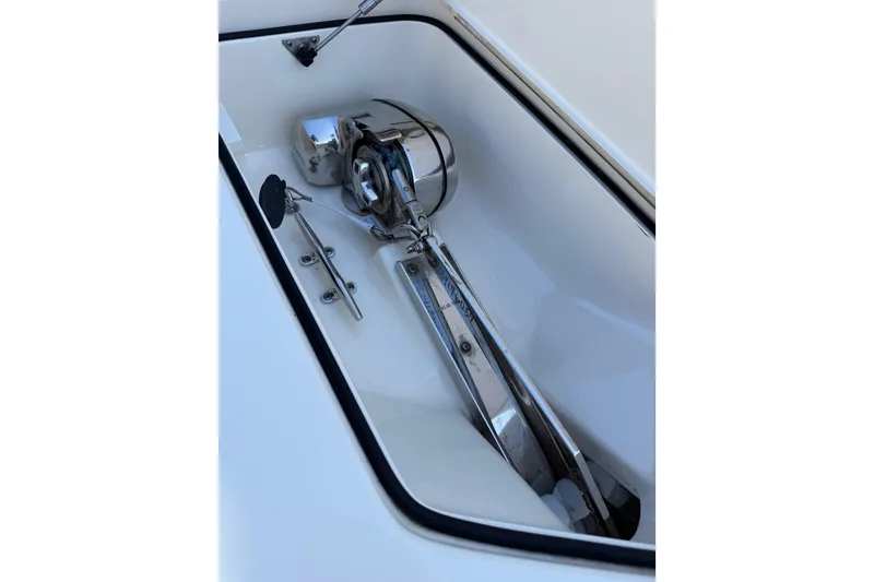 Slide: The Image of 2024 Scout 260 LXF boat anchor compartment with stainless steel fittings. - 37