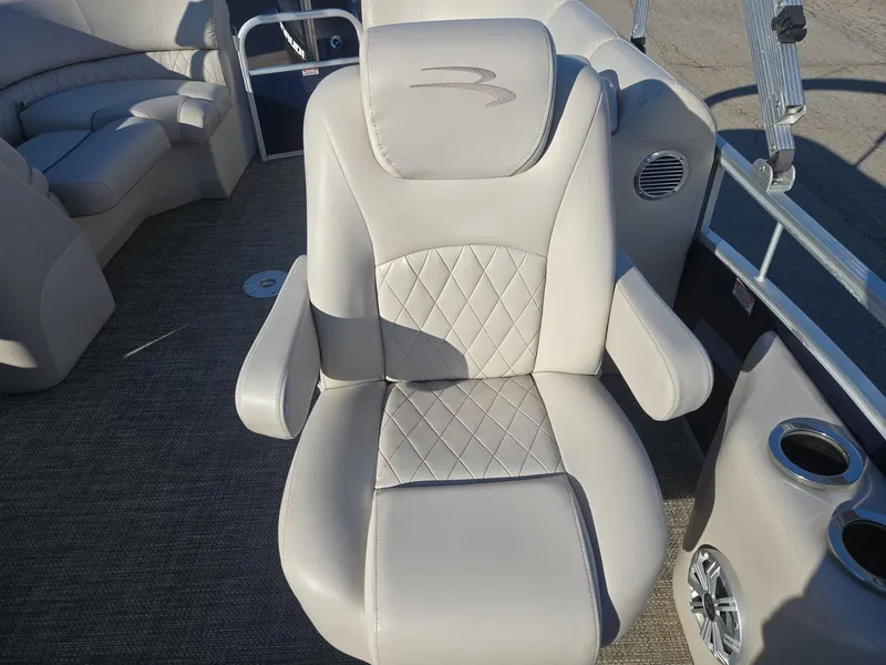 Slide: The Image of Luxurious seating on a 2015 Bennington 2250 GSR pontoon boat. - 14