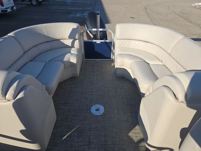 Slide: The Image of Interior of a 2015 Bennington 2250 GSR pontoon boat with beige seating. - 15