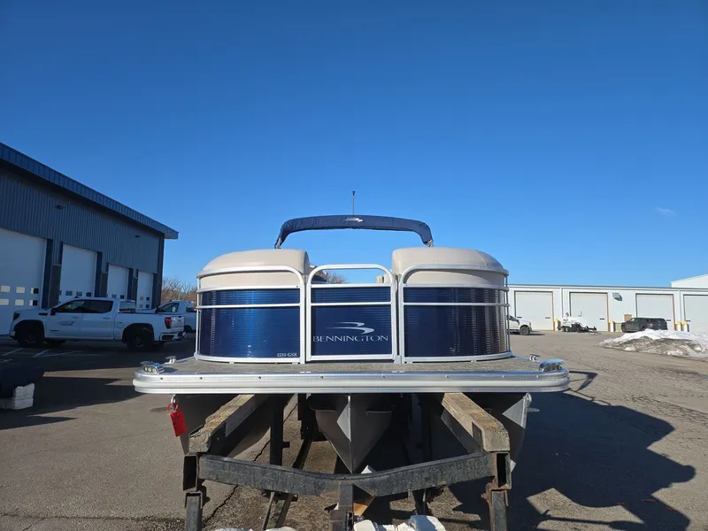 Slide: The Image of 2015 Bennington 2250 GSR pontoon boat on trailer, blue sky. - 3