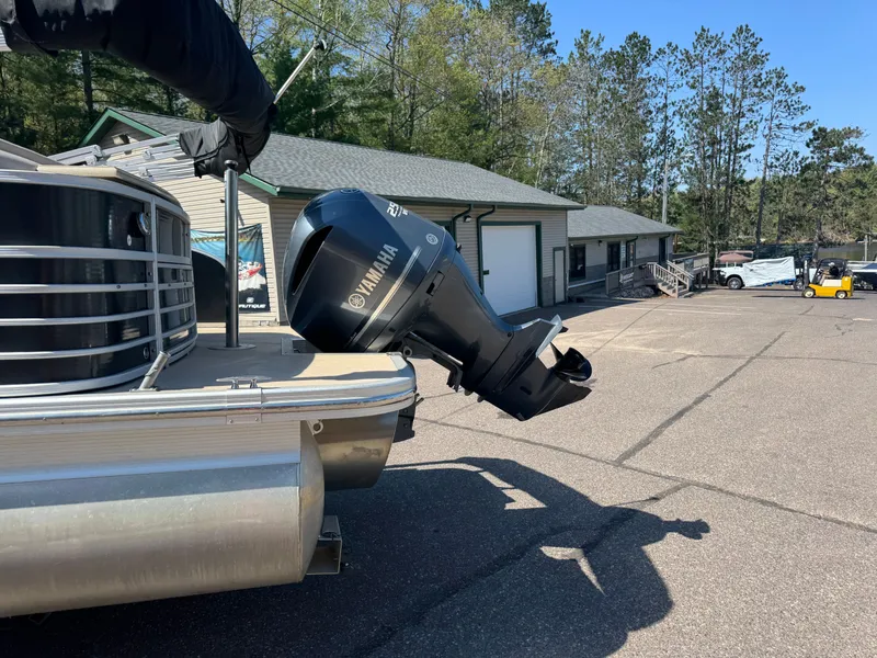 Slide: The Image of 2013 Bennington 2550RCB ESP TRI with Yamaha motor on parking lot. - 5