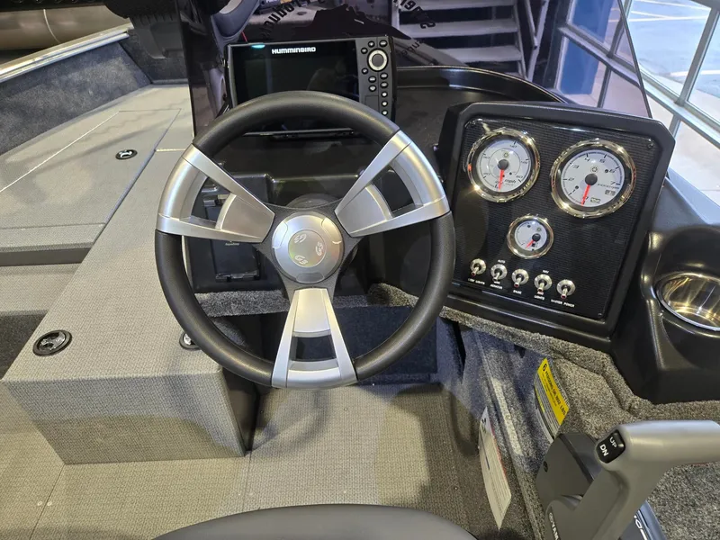 Slide: The Image of Steering wheel and dashboard of a G3 AV 178 C boat, year 2026. - 10