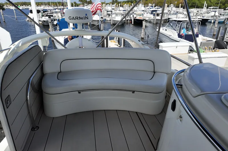 Slide: The Image of Luxury seating on 2007 Cranchi Atlantique 40 yacht, docked at marina. - 28