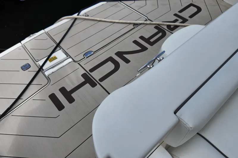 Slide: The Image of 2007 Cranchi Atlantique 40 yacht deck with branding and mooring line. - 29