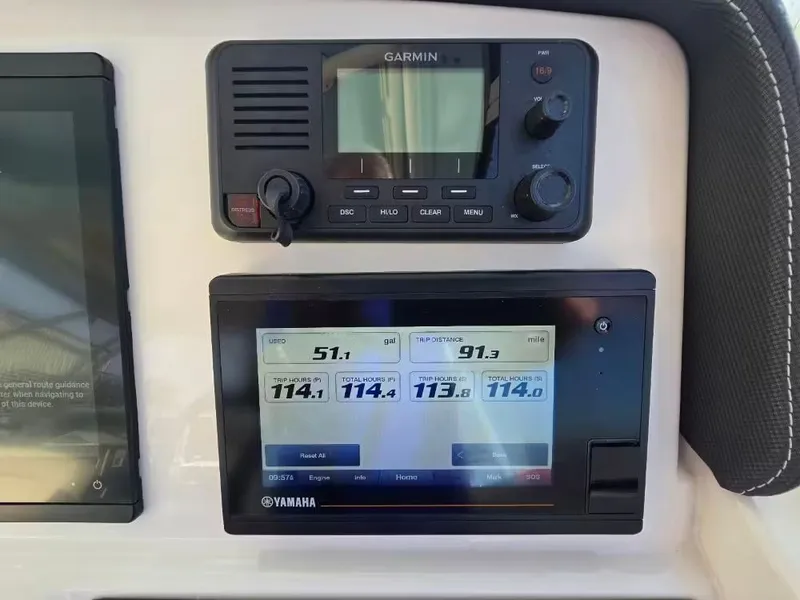 Slide: The Image of Garmin and Yamaha displays on Grady-White Freedom 285, year 2022. - 10